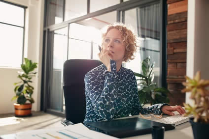 Image: /uploads/blog/woman%20at%20desk%20thinking.jpg